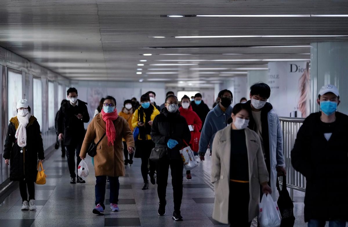 China slowly gets back to work as coronavirus toll hits daily record