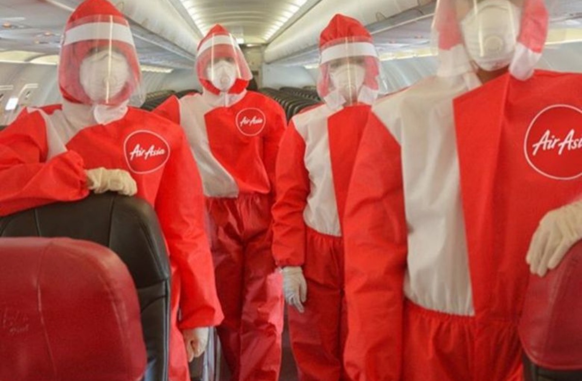 AirAsia unveils red PPE suits for cabin crew