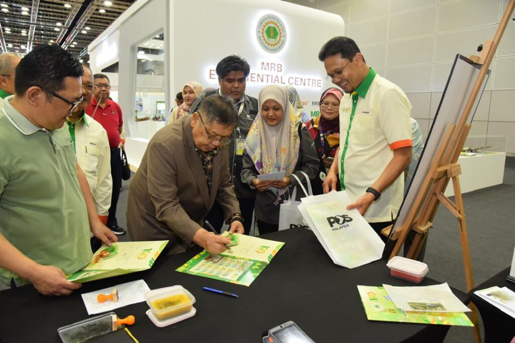 Dato Dr Zairossani Mohd Nor and Dato Lat | Pos Malaysia Launches 100th Anniversary of Rubber Research in Malaysia Commemorative Stamp Collection