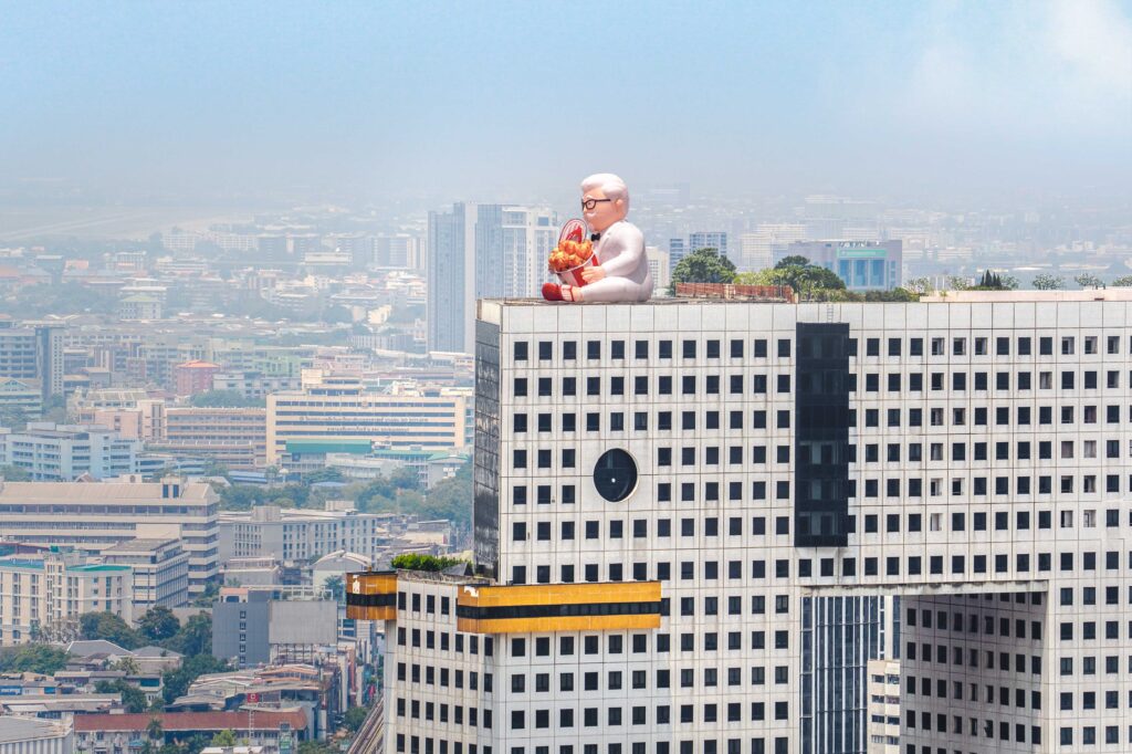 KFC Thailand Turns Wet-Season Misery into a Songkran Moment Too Big to Miss 4 KFC Songkran Festival 2026 Colonel Sanders at Bangkoks landmark Elephant Tower 01 | KFC Thailand Turns Wet-Season Misery into a Songkran Moment Too Big to Miss