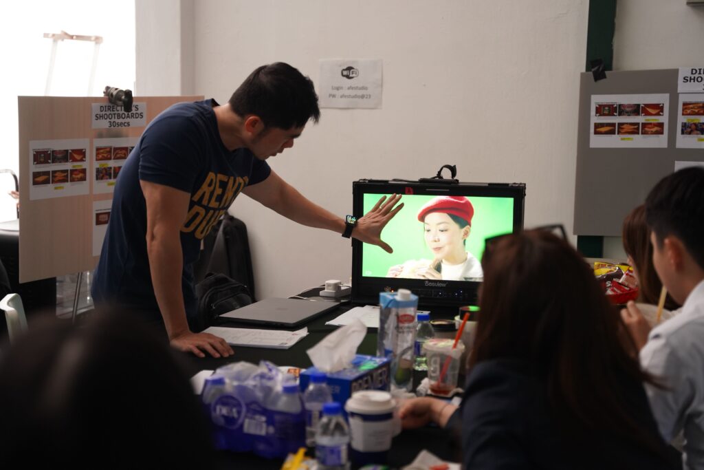 President BTS Director Mun Shen explaining shot to clients 1 | THE SHOUT GROUP EXTENDS NEW BUSINESS WIN STREAK WITH FIVE NEW CLIENTS
